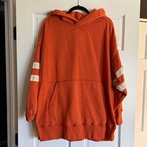 Free People Oversized Orange Hoodie with White Sleeve Stripes